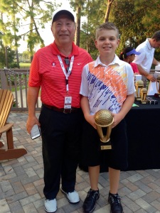 Earl Fritz , CJGA founder and 2014 Ontario golf hall of fame inductee Peter Blazevic , champion Boys 9-10 division CJGA World Junior Challenge at Innisbrook, Palm Harbor Florida 